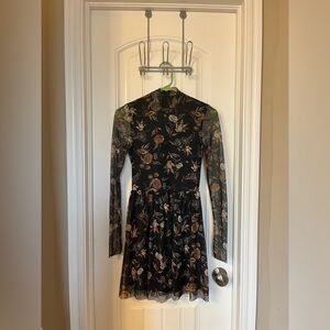 Long sleeve flowery black dress with mauve undertones. From Altar’d State.